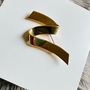 Vintage Monet Gold plated Swoosh Pin